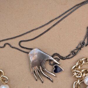 Vintage Artisan Made Silver Heart in Hand Pendant with Blue Enamel Heart